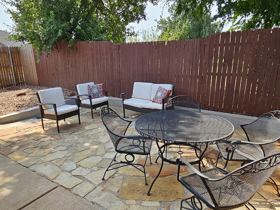 Enjoy the Private back patio with sitting area for you to enjoy after a long day of work..