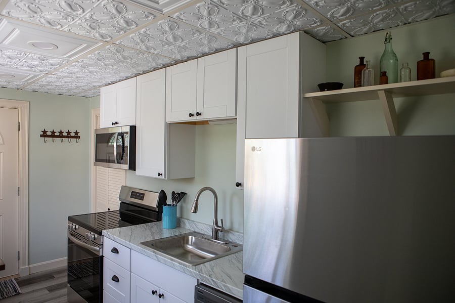 This fully stocked kitchen is brand new. You will have a full sized fridge and oven, microwave and even a dishwasher.