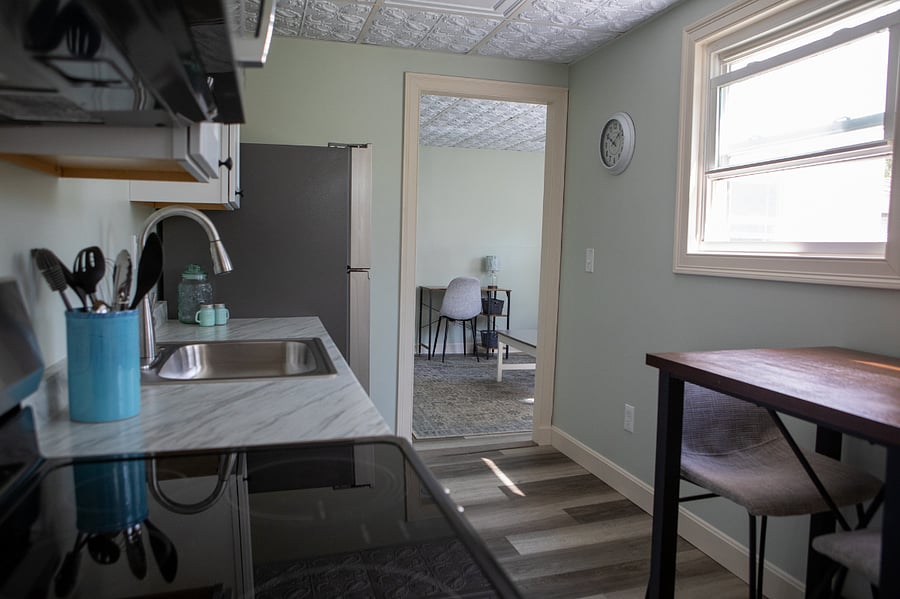 This fully stocked kitchen is brand new. You will have a full sized fridge and oven, microwave and even a dishwasher.