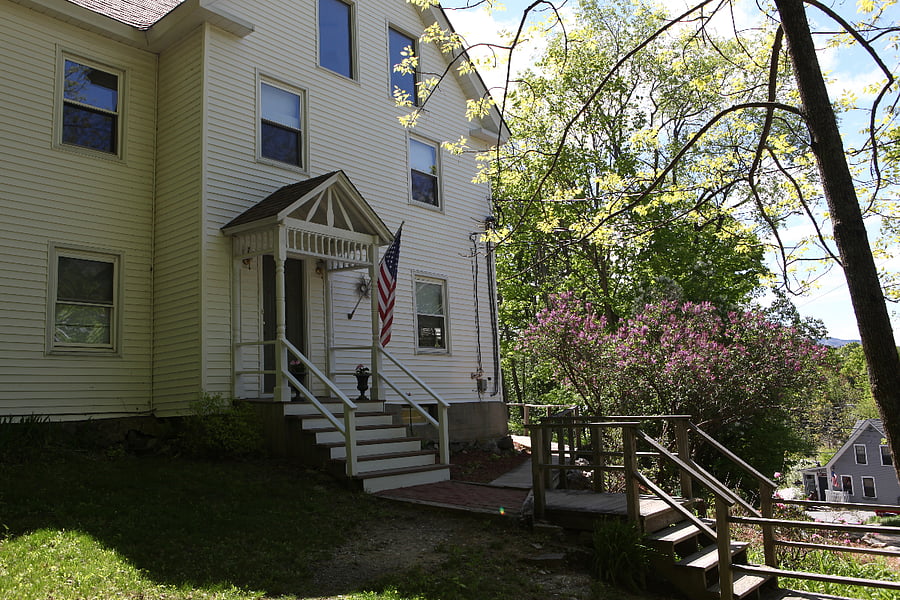 There are steps to get to the ground floor apartment, which is around the side of the house