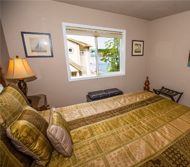 Zoom lens photo of bedroom. Captures partial view from bedroom window