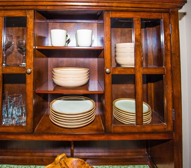 Zoom lens photo of hutch in walkway from kitchen to living area