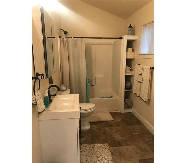 Full sized bathroom with insta hot water