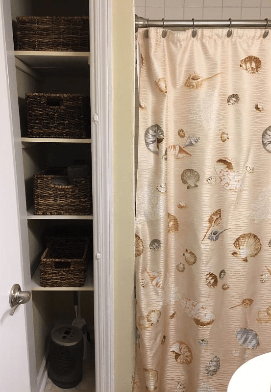 Bathroom with storage shelves