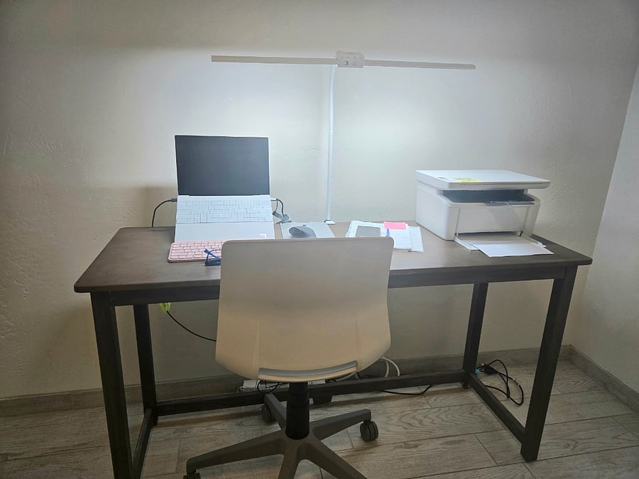 Large bedroom. This shows how you could set up your home office on the 55 inch desk with 31 inch lamp and desk chair.