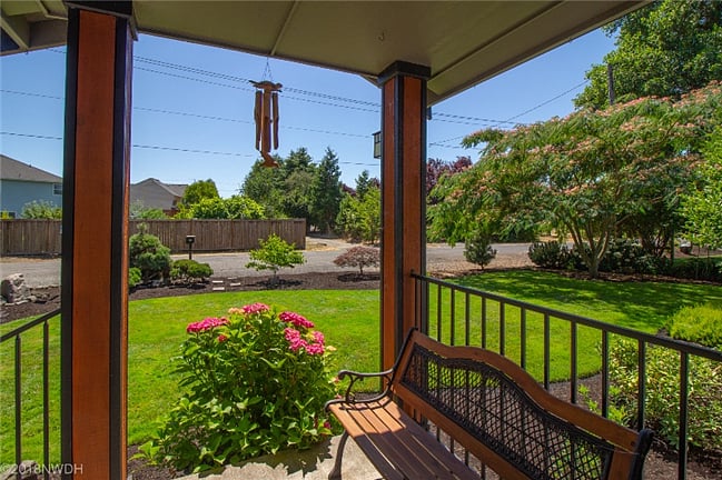 In the summer, enjoy the beautiful Mimosa and pink hydrangea from the porch