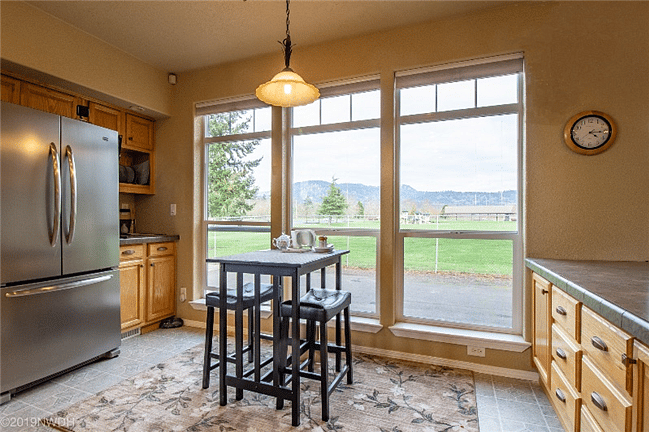 Enjoy the view from the nook next to the kitchen for quick, informal meals