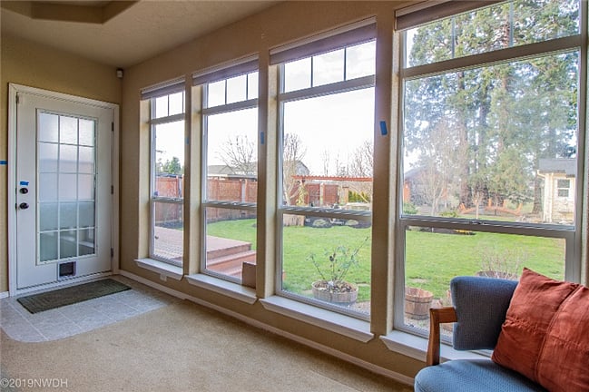 The back door to the deck is off of the family room