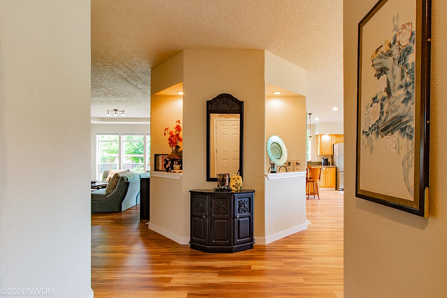 The living/family room is on the left, Dining room and nook are on the right.