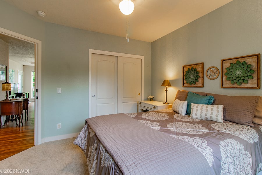 Master suite includes quality queen mattress and storage furnishings including desk/vanity, chest of drawers, dresser.