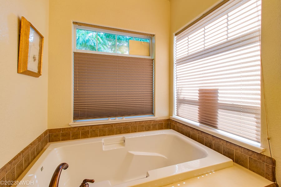 Primary bath includes soaker tub