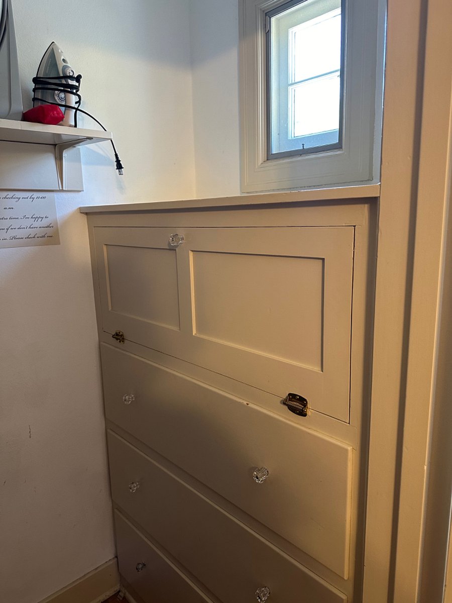 Built in dresser with large drawers in the closet