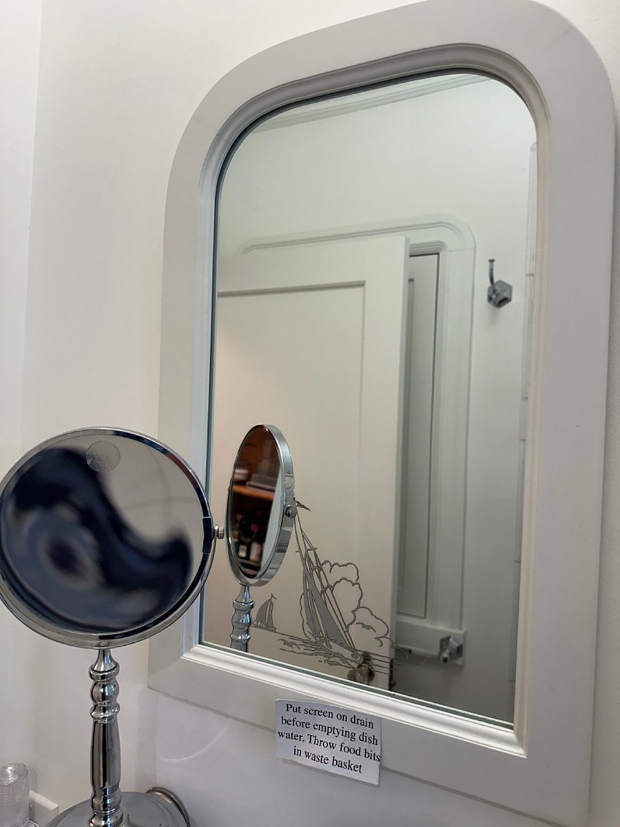 An antique mirror as well as a 10x one.
