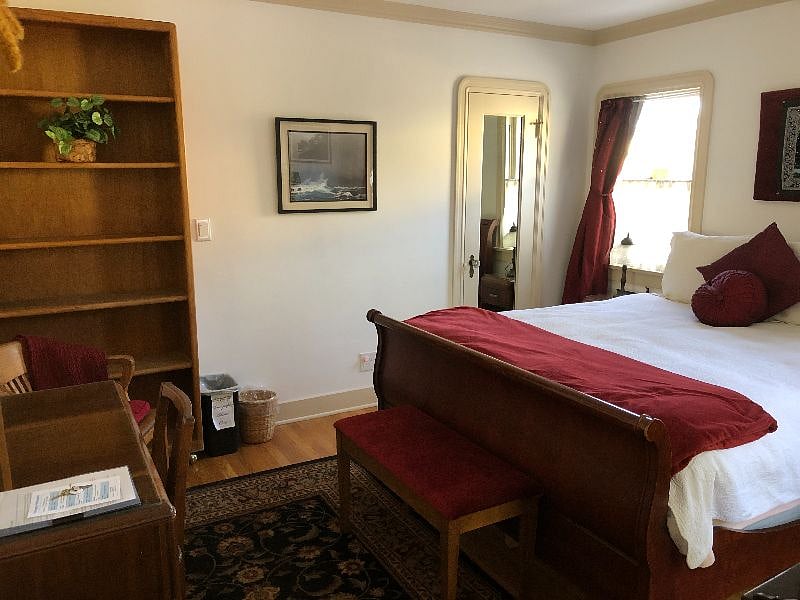 The large bedroom is full of light, but has blackout shades to ensure you have a good sleep.