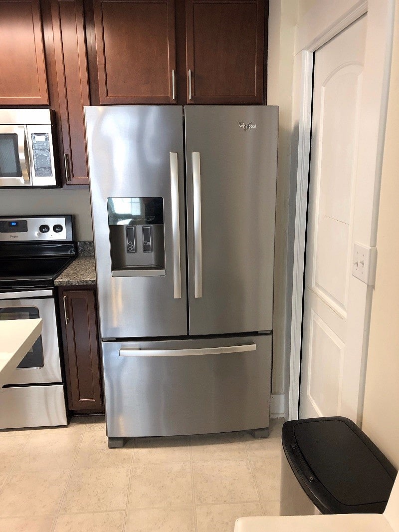 Huge refrigerator with freezer on the bottom