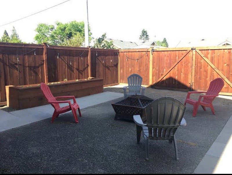 backyard fire pit and garden box.