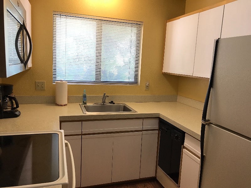 Kitchen has full-size appliances and stocked pantry