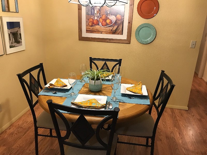 Dining room table with four chairs.