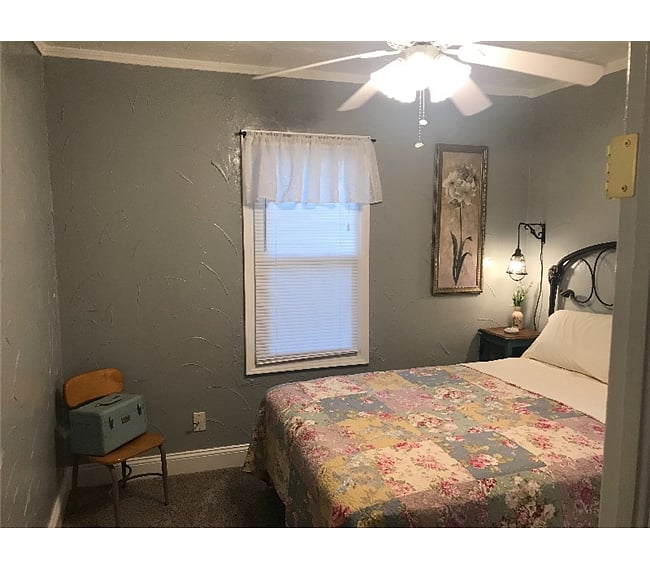 Room has full sized bed.