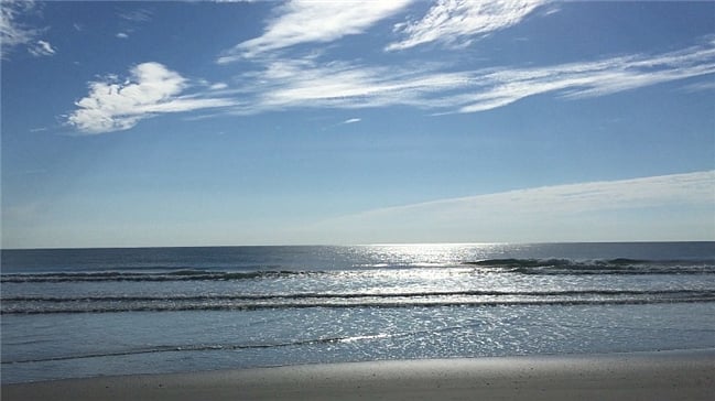 the beach on a Saturday morning just past sunrise
