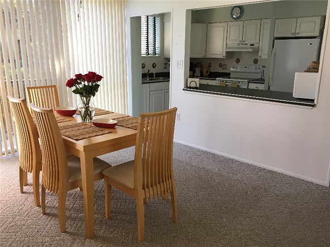 view of full dining room into kitchen
