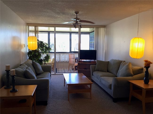 large living room, with sliding doors to Florida room