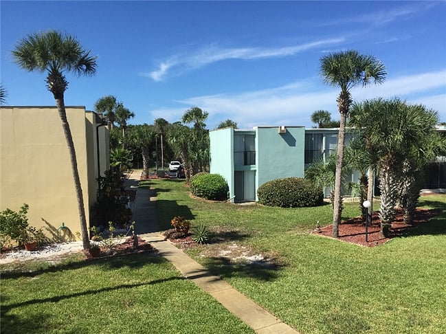 sun and sky from Florida room--view into condo area courtyard