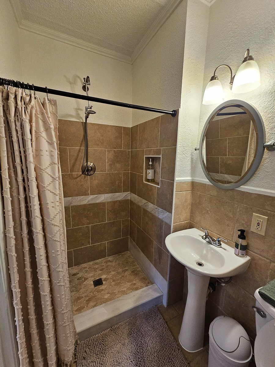 Shower with hand held shower head