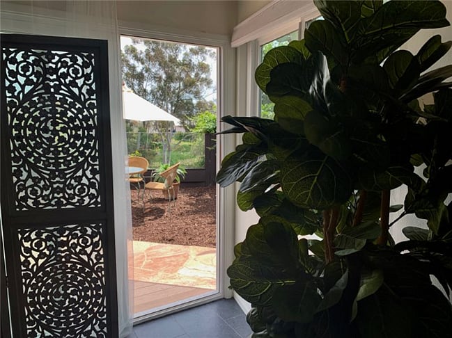 Moroccan screen provides shade and privacy.