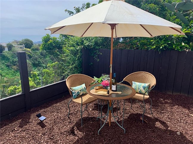Canyon and ocean views from the dining area outside in your private yard.