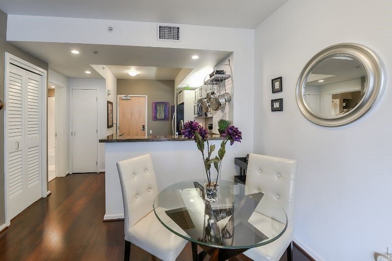 Dining table with comfortable leather chairs.