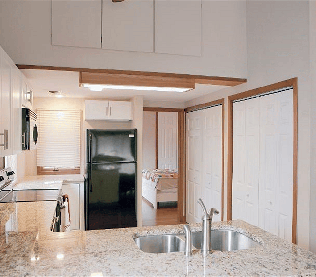 Well-equipped kitchen with pantry & laundry, including washer/dryer.