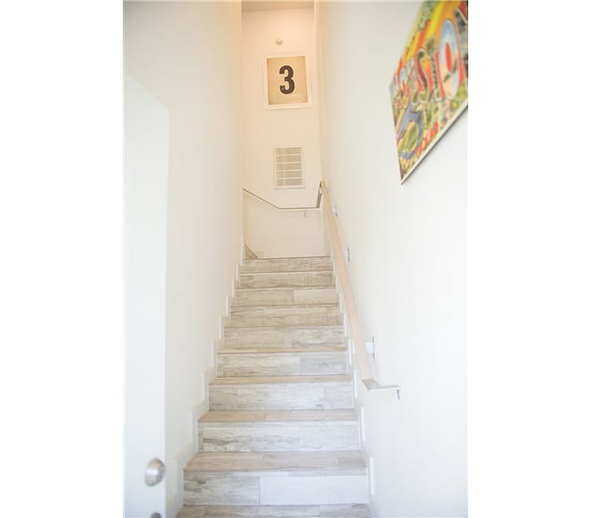 Enter through your private garage bay or exterior doors.