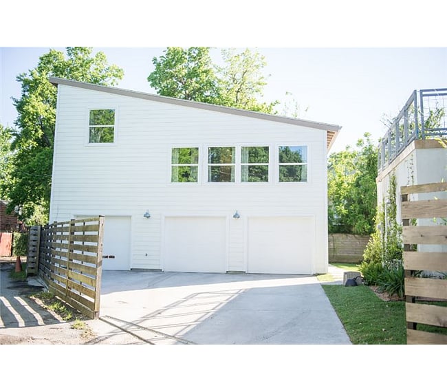 Gated property where guests have access to their own garage bay. Park inside the garage and slip away to privacy. The home is located on a quiet neighborhood road.