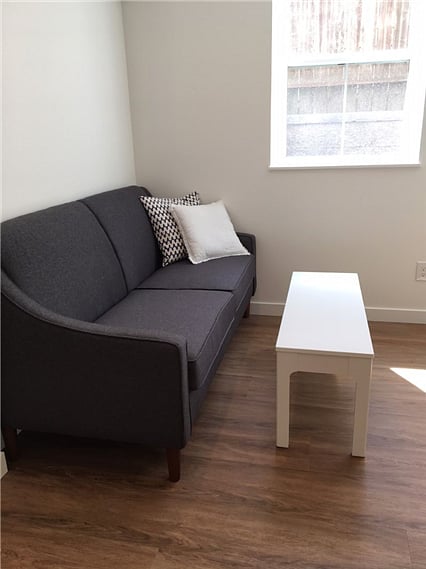 Couch with coffee table in living area