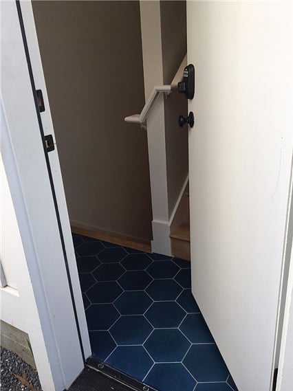 Cement tile entry to private downstairs unit