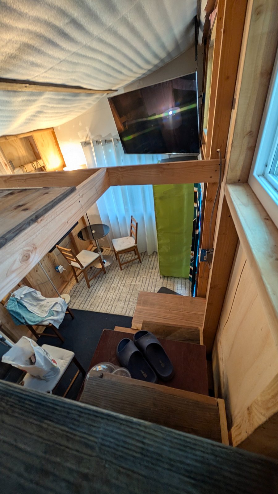 Table & wardrobe view from loft. The TV is above here