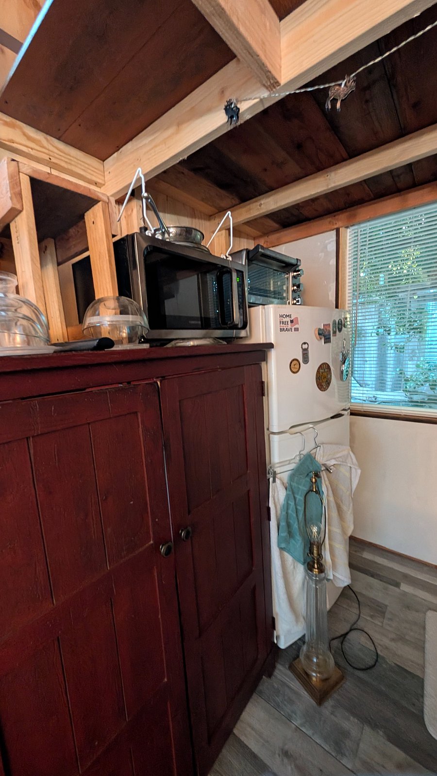 Desk, refrigerator & east window