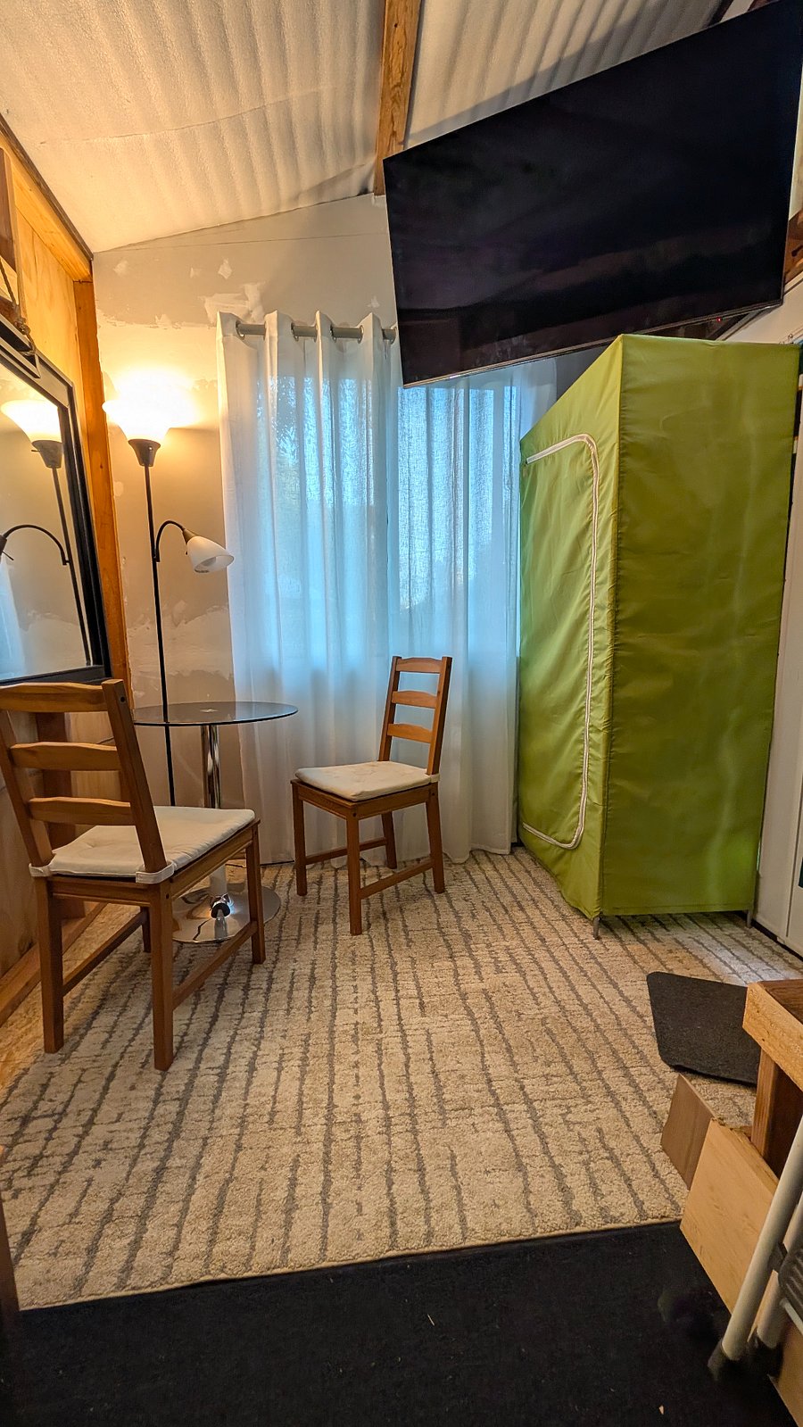 Table, wardrobe & west window