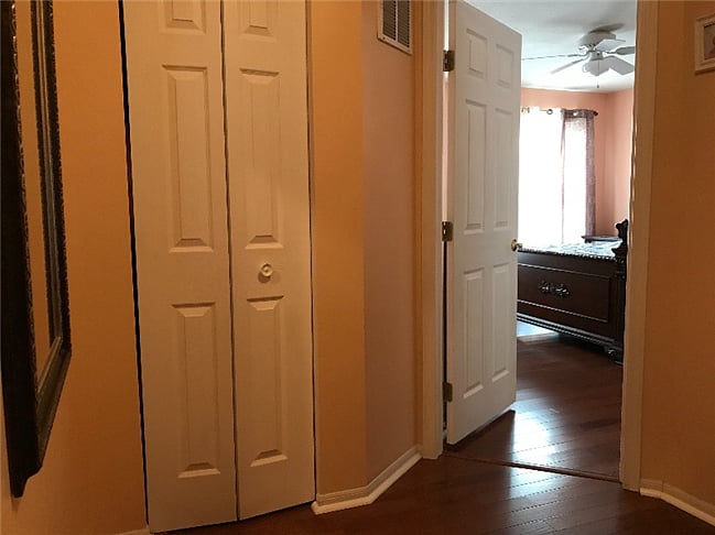 Extra closet in the hallway between two bedrooms 
