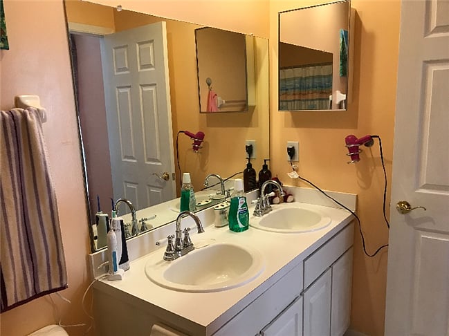 One of the master bathroom, this one with double sinks 