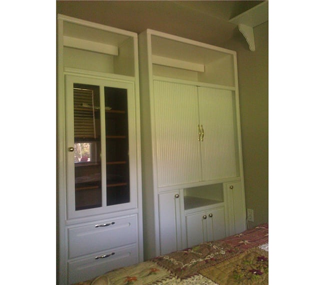 In your room this entertainment center acts as your closet and dresser.