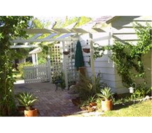 This is the gate looking from the south. It's a small breezeway and place to sit.