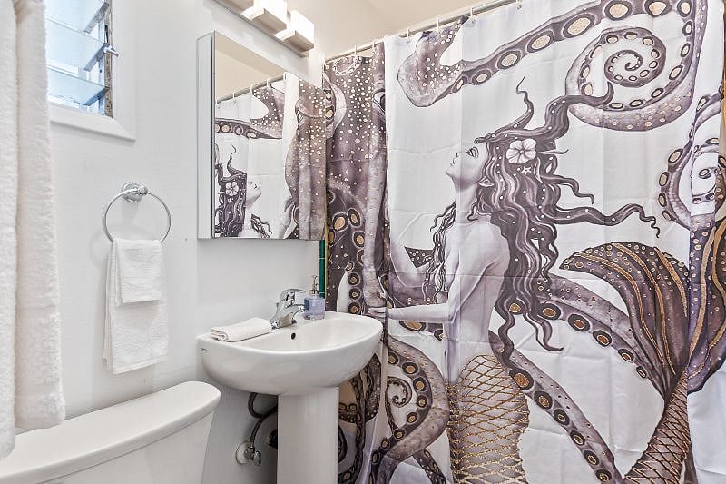Clean, fully stocked bathroom