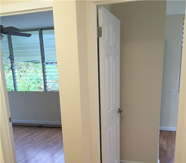 End of hallway; entry into bedrooms