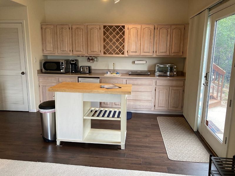 Kitchen & utility closet w/washer and dryer and storage. French doors entry #1