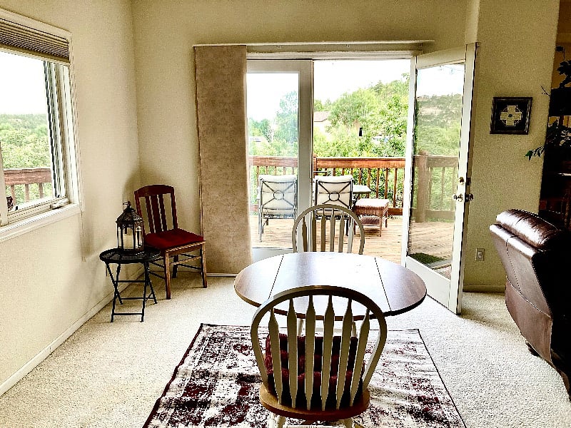 Eating area and French doors entry #2 to private deck