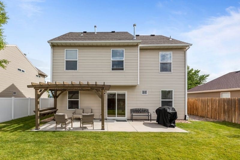 Great back yard with fire pit and grill