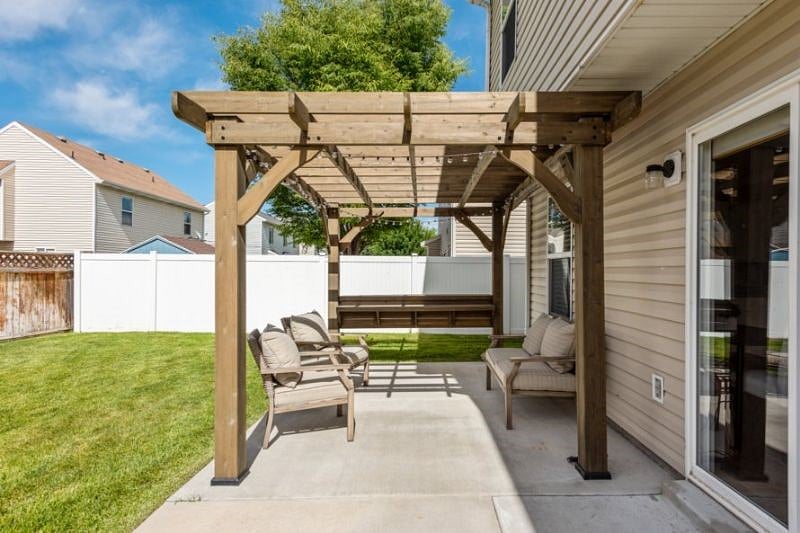 Great back yard with fire pit and grill too!