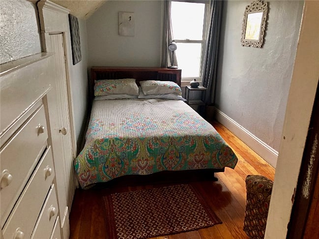 Full size bed. Left bedroom